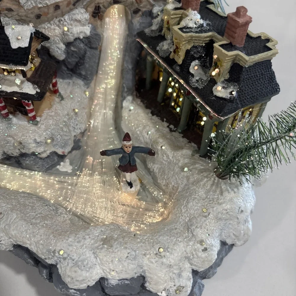 Beautiful vintage fiber optic Christmas village that light up the city-Avon 2003